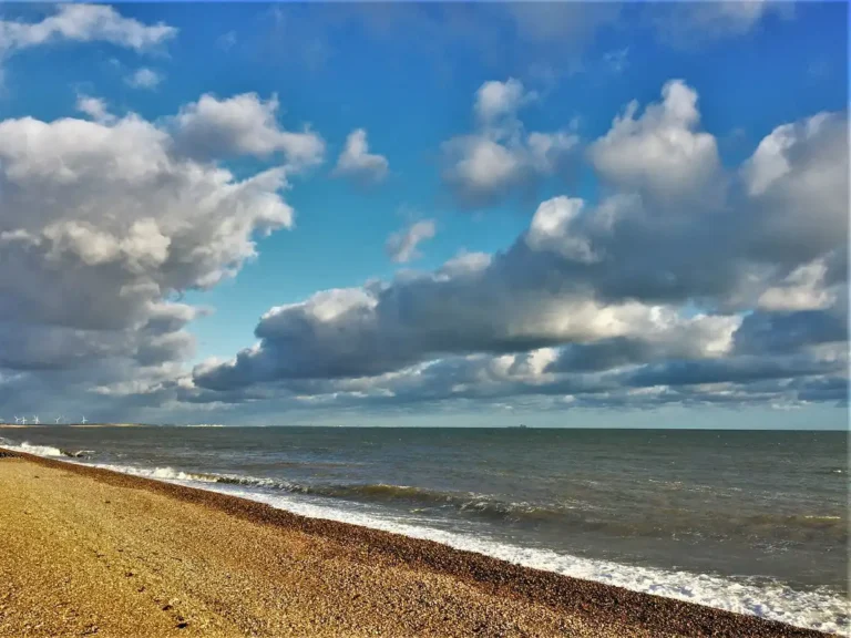 A view along a pebbled beach.